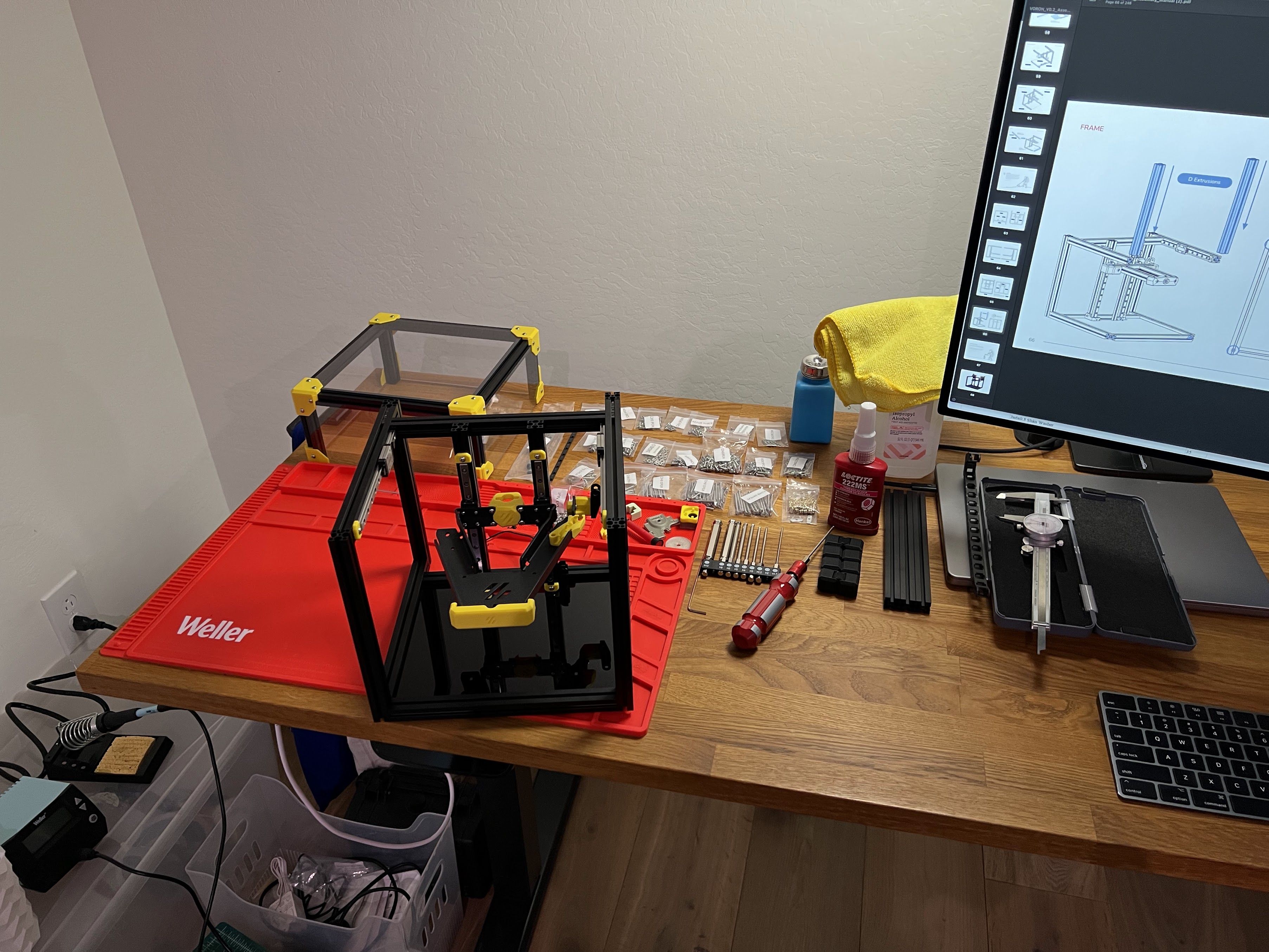 Voron 0 entire frame with bed built and the top hat in the background on a desk