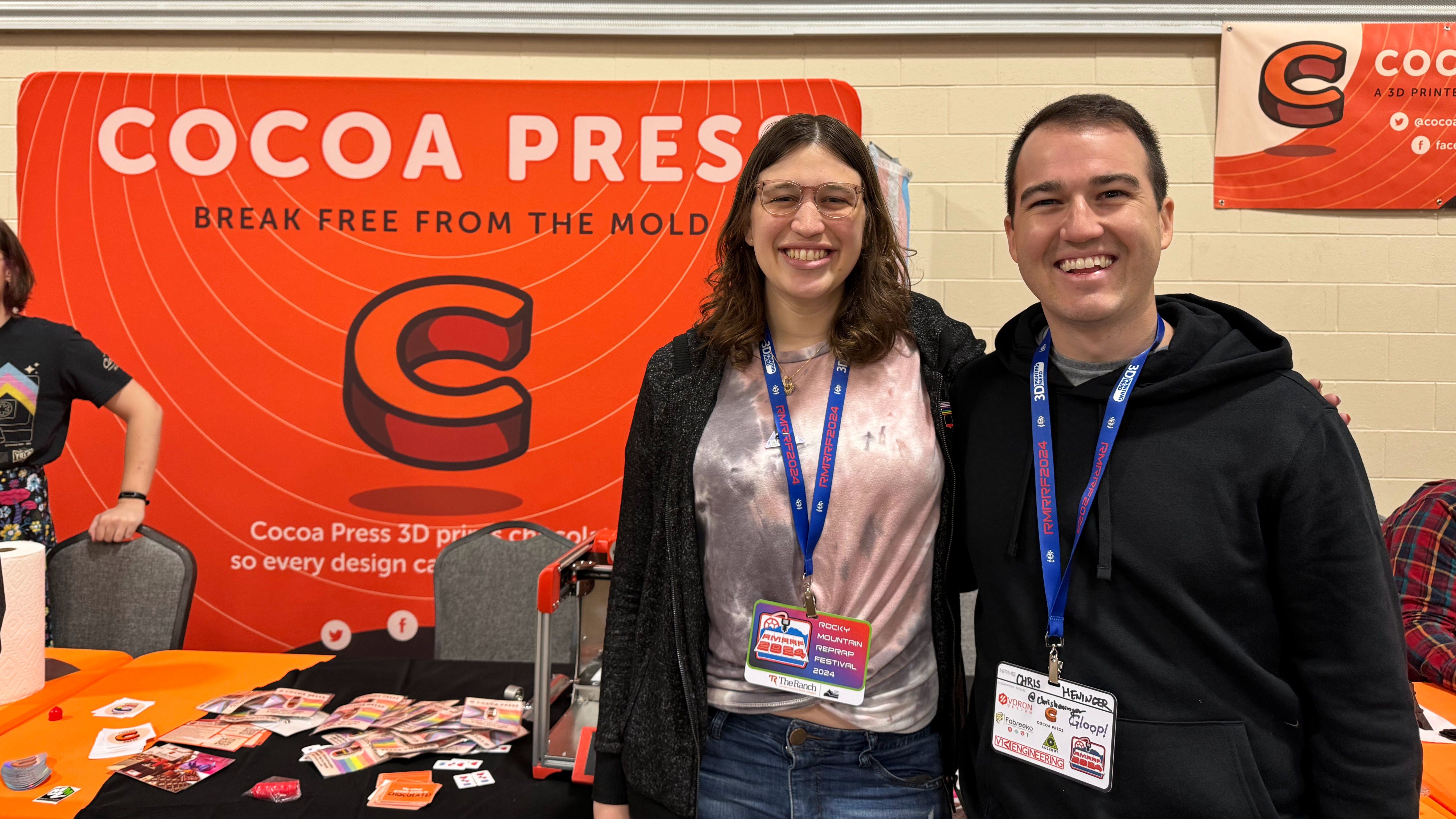 Chris Heninger standing with Ellie Weinstein, inventor of the Cocoa Press